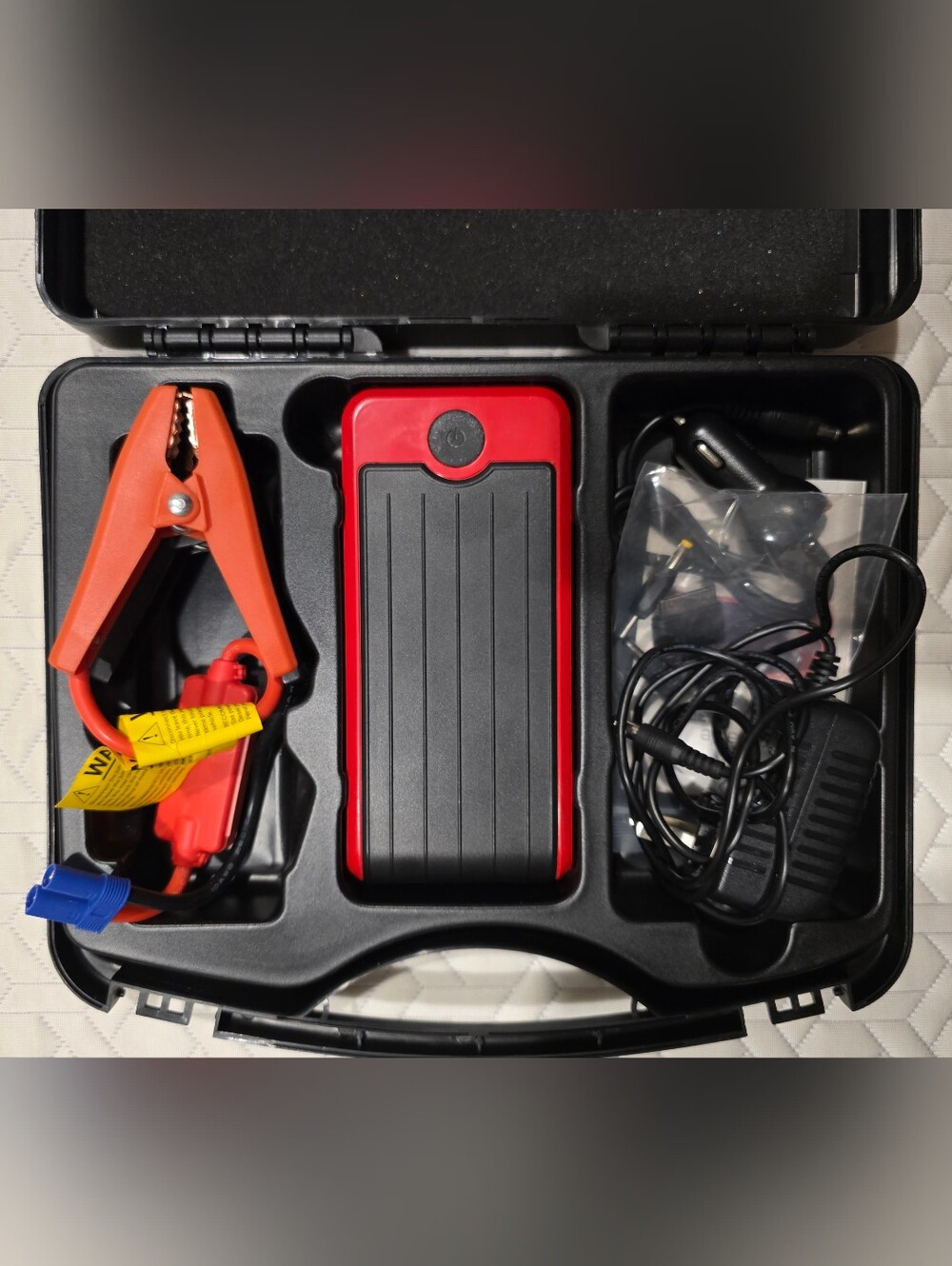 Portable Red and Black Jump Starter Power Bank - Compact Battery Pack